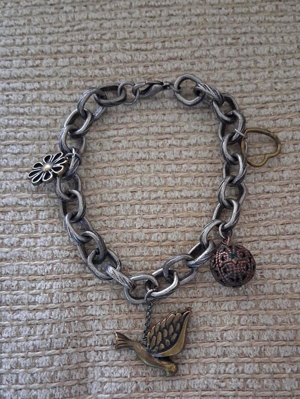 Vintage-inspired Silver Chain Bracelet with Bronze Dove Charm